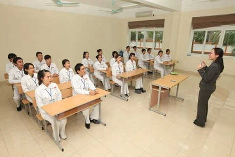 Вьетнамские рабочие изучают японский язык (Фото: ВИA)