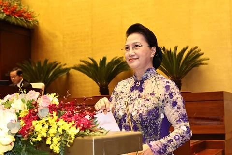 Председатель НС Нгуен Тхи Ким Нган выступает на открытии заседания. (Фото: ВИА)