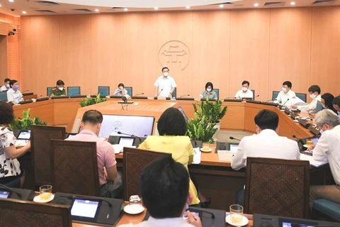 Заместитель председателя муниципального народного комитета Тьы Суан Зунг на заседании. (Фото: ВИА)
