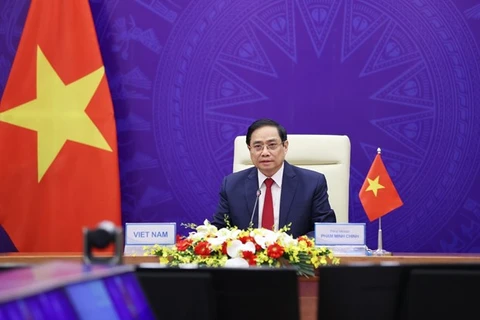 Премьер-министр Вьетнама Фам Минь Тьинь выступает на мероприятии (Фото: ВИА)