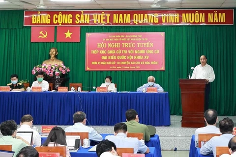 Президент Нгуен Суан Фук представил программу действий в общине Фыоктхань, уезд Кутьи. (Фото: Тхонг Нят/ВИА)