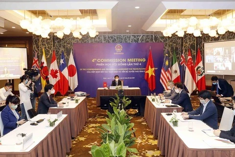 Вьетнамская делегация присутствует на встрече в режиме видеоконференции. (Фото: ВИА)