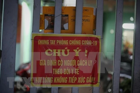 Предупреждающий знак объявляет о самоизоляции в квартале Мидьем 1, уезд Вьетйен, провинция Бакжанг. (Фото: ВИА)