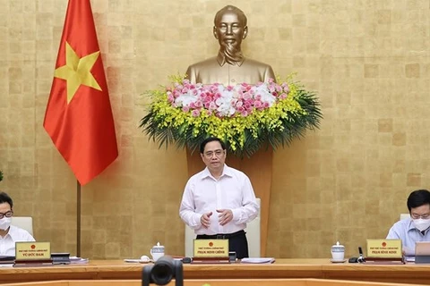 Премьер-министр Фам Минь Тьинь выступает на мероприятии (Фото: ВИА) 