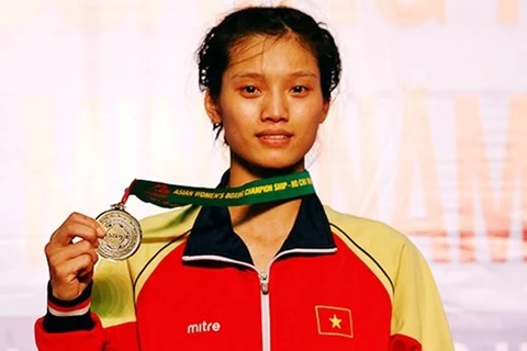 Нгуен Тхи Там - первая вьетнамская боксерша, завоевавшая золотую медаль на чемпионате Азии по боксу среди женщин в 2017 году (Фото: ВИА)