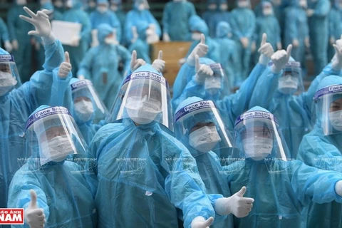 Вера в успех у врачей, включенных в борьбу против эпидемии в Хошимине. (Фото: ИЖВ)