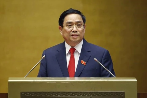 Премьер-министр Фам Минь Тьинь произносит свою инаугурационную речь. (Фото: ВИА)