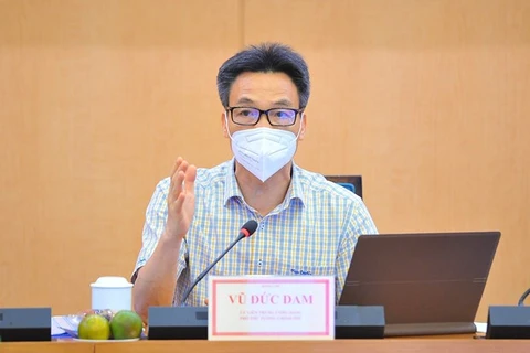 Заместитель премьер-министра Ву Дык Дам провел рабочее совещание с руководством Ханоя по профилактике и борьбе с COVID-19 (Фото: ВИА)