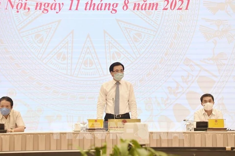 На пресс-конференции председательствовал министр, председатель канцелярии правительства, официальный представитель правительства Чан Ван Шон. (Фото: ВИА)