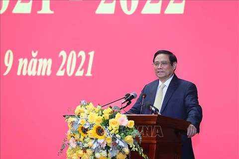 Премьер-министр Фам Минь Тьинь выступает на церемонии открытия учебного года. (Фото: ВИА)
