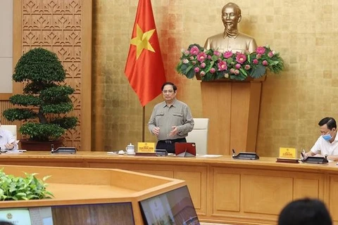 Премьер-министр Фам Минь Тьинь провел заседание Национального руководящего комитета по профилактике COVID-19 и борьбе с ним. (Фото: ВИА)