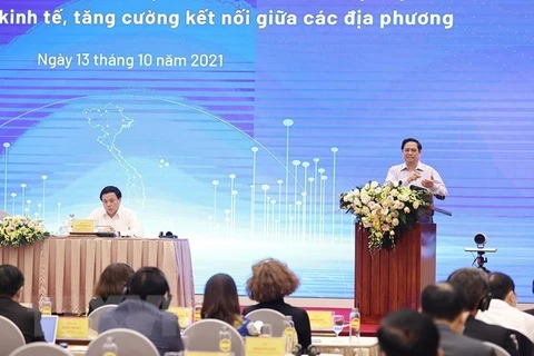Премьер-министр Фам Минь Тьинь выступает на мероприятии. (Фото: ВИА)