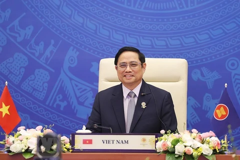 Премьер-министр Фам Минь Тьинь принял участие в 24-м саммите АСЕАН-Китай. (Фото: Зыонг Жанг/ВИА)