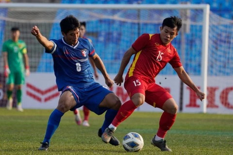 Ле Ван Суан (15) забил единственный гол для сборной Вьетнама U23. (Фото: webthethao.vn)