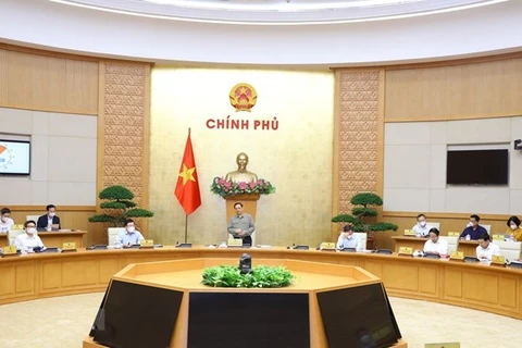 Премьер-министр Вьетнама Фам Минь Тьинь председательствует на очередном октябрьском заседании правительства (Источник: ВИA)