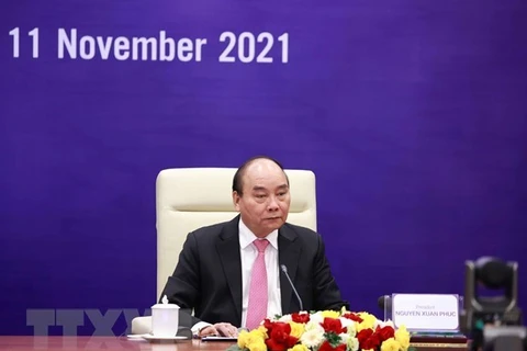 Президент Нгуен Суан Фук принимает участие в ежегодном диалоге между лидерами экономик Азиатско-Тихоокеанского экономического сотрудничества (АТЭС) и Деловым советом АТЭС. (Фото: ВИА)