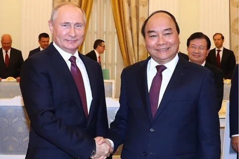 Документальное фото: премьер-министр Нгуен Суан Фук и президент России Владимир Путин во время официального визита в Российскую Федерацию во второй половине дня 22 мая 2019 г. (Фото: ВИА)