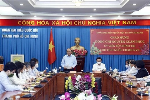 Президент Нгуен Суан Фук выступает на встрече. (Фото: ВИА) 