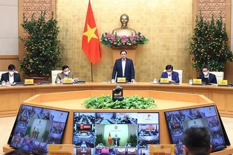 Премьер-министр Фам Минь Тьинь выступает на мероприятии. (Фото: ВИА)