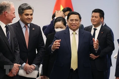Премьер-министр Фам Минь Тьинь принимает руководителей Asia Group и корпораций, инвестирующих во Вьетнам: Blackstone, GenX, AES, Exxon Mobil. (Фото: ВИА)