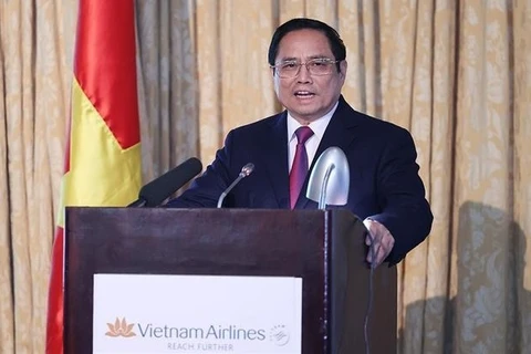 Премьер-министр Фам Минь Тьинь выступает на вьетнамско-американской конференции по продвижению торговли, инвестиций и туризма . (Фото: ВИА)