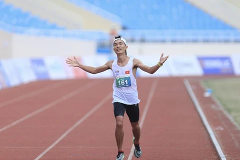 Хоанг Нгуен Тхань вошел в историю как первый золотой медалист Вьетнама в мужском марафоне на Играх ЮВА. (Фото: ВИА)