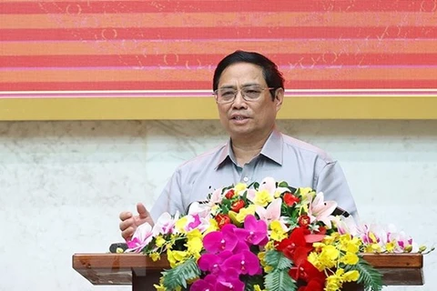 Премьер-министр Вьетнама Фам Минь Тинь выступает на рабочем совещании с ключевыми руководителями провинции Хаужанг. (Фото: ВИА)