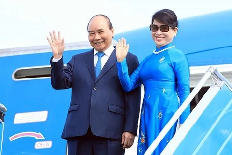 Президент Вьетнама Нгуен Суан Фук и супруга Чан Нгует Тху. (Фото ВНА)