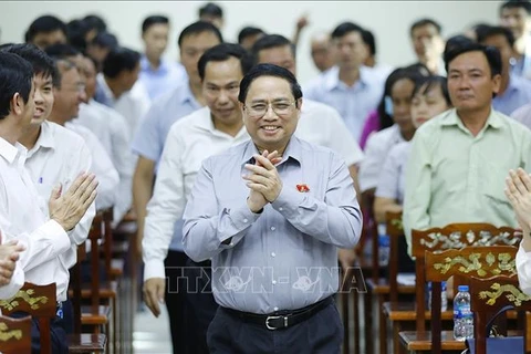 Премьер-министр Фам Минь Тьинь принял участие во встрече с избирателями в городе Кантхо. (Фото: ВИА)