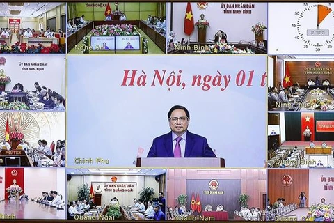 Премьер-министр Фам Минь Тьинь провел онлайн-конференцию по предотвращению и борьбе с незаконным рыболовством. (Фото: Зыонг Жанг/ВИА)