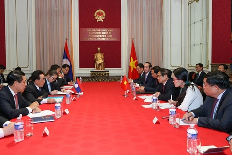 Премьер-министр Фам Минь Тьинь подтвердил, что Вьетнам готов поддержать Лаос в успешном выполнении международных обязательств, включая организацию 10-го саммита ACMECS в 2023 году и председательство в АСЕАН в 2024 году. (Фото:VGP)
