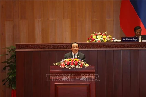 Новоиспеченный премьер-министр Лаоса Сонексай Сипандоне выступил с речью во второй половине дня 30 декабря. (Фото: ВИА)