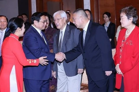 Премьер-министр Фам Минь Тьинь встретился с делегацией китайских ученых-друзей в Пекине. (Фото: ВИА)