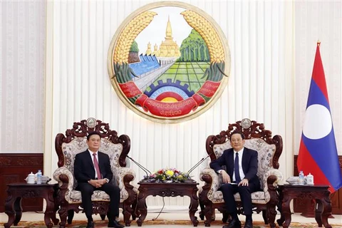 Премьер-министр Лаоса Сонексай Сипхандоне принял председателя Народного совета провинции Нгеан Тхай Тхань Куи. (Фото: ВИА) 