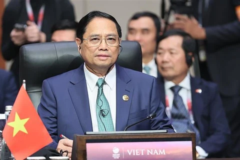 Премьер-министр Фам Минь Тьинь выступает на 11-м саммите АСЕАН-США. (Фото: Зыонг Жанг/ВИА)