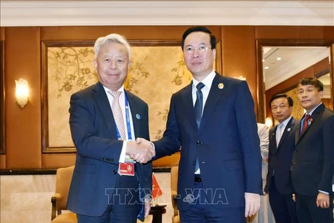 Президент Во Ван Тхыонг встретился с председателем АБИИ. (Фото: Тьен Чунг, корреспондент ВИА в Китае)