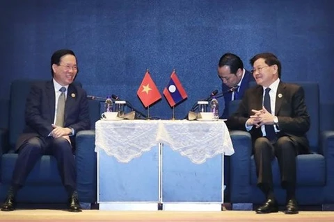 На встрече Президента Во Ван Тхыонг с Генеральным секретарем ЦК Народно-революционной партии Лаоса, Президентом Лаоса Тхонглуном Сисулитом. (Фото: ВИА) 