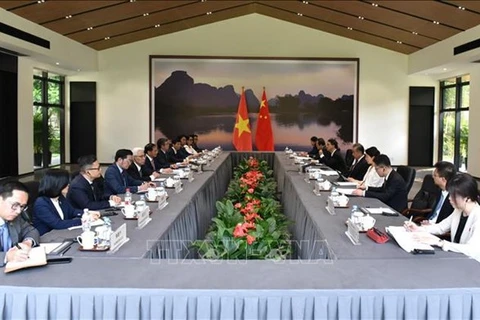 Переговоры между министрами иностранных дел Вьетнама и Китая в провинции Гуанси 4 апреля (Фото: ВИA)