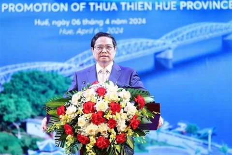 Премьер-министр Фам Минь Тьинь выступает на конференции (Фото: ВИA) 