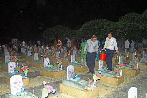 На вьетнамско-лаосском международном кладбище (Фото: ВИА)