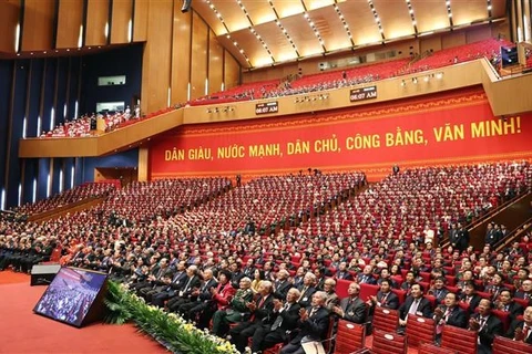 Делегаты присутствуют на церемонии открытия XIII всевьетнамского съезда КПВ. (Фото: ВИА) 