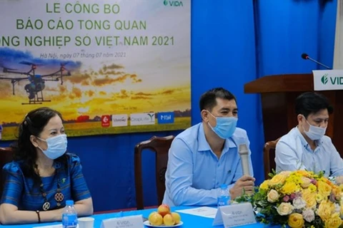 Вьетнамская ассоциация цифрового сельского хозяйства представляет первый в истории отчет о сельском хозяйстве страны в 2021 году в Ханое 7 июля (Фото: ВИА)