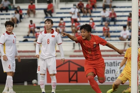Сан Тоу Тоу из Мьянмы празднует свой гол в плей-офф за третье место против Вьетнама