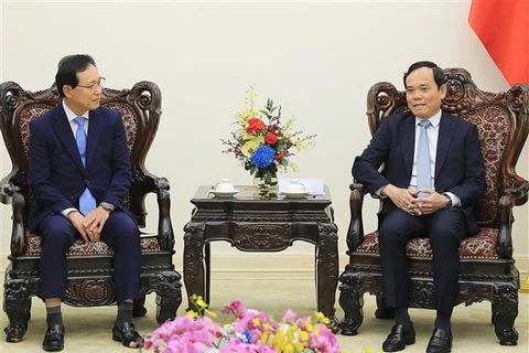 Вице-премьер Чан Лыу Куанг принял генерального директора комплекса «Samsung Vietnam» Чхве Джу Хо. (Фото: ВИА)