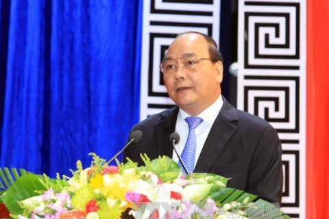 越共中央政治局委员、政府副总理阮春福致辞