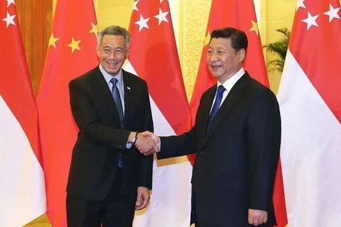 中共中央总书记，国家主席习近平与新加坡总理李显龙。