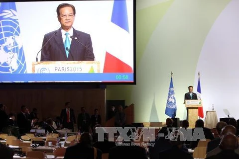 越南政府总理阮晋勇主持召开应对九龙江三角洲气候变化的对话会（图片来源：越通社）
