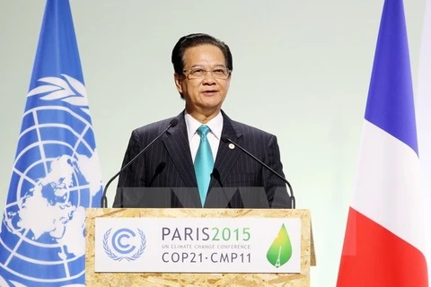越南政府总理阮晋勇在COP 21大会上发表讲话（图片来源：越通社）