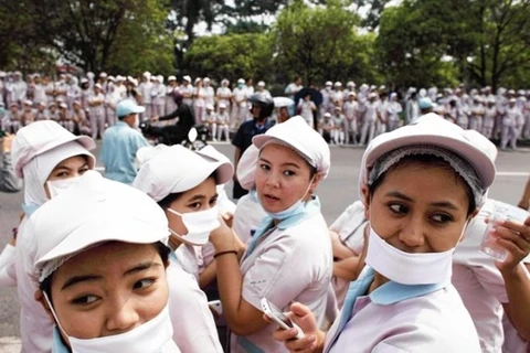 印尼劳动者​ （图片来源：Reuters）