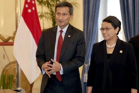 新加坡外长维文与印尼外长雷特诺。